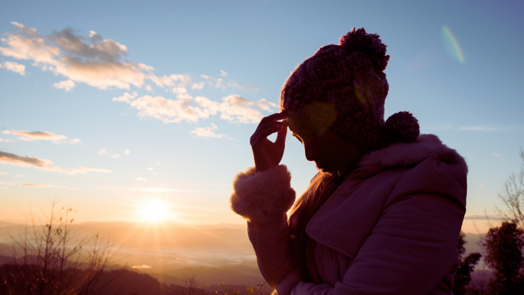 A woman holding her head in distress